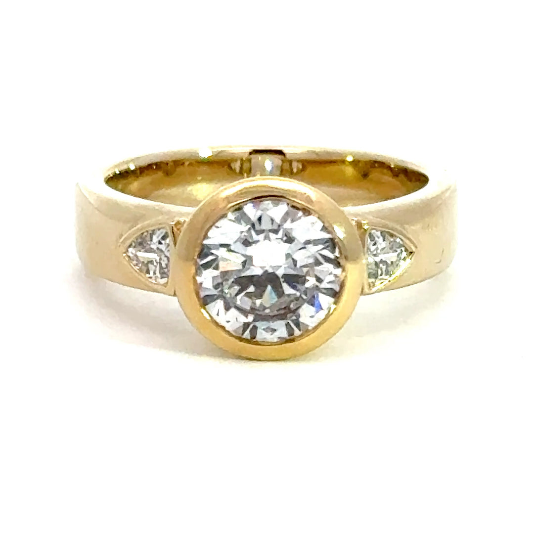 2.2 ctw round diamond bezel three-stone trillion wide band engagement ring - Workshop Fine Jewelry