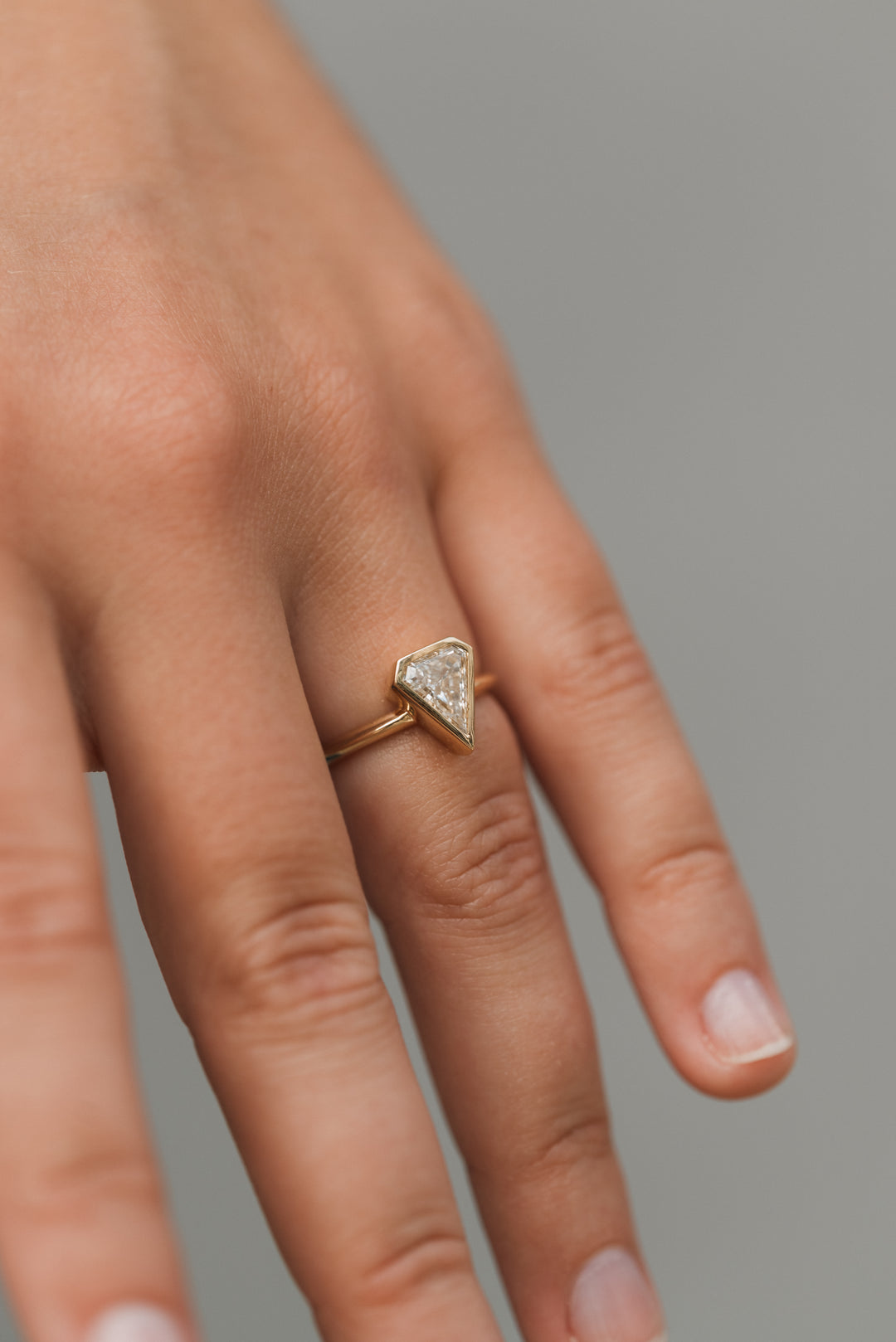 1.37 ct kite diamond full-bezel engagement - Workshop Fine Jewelry