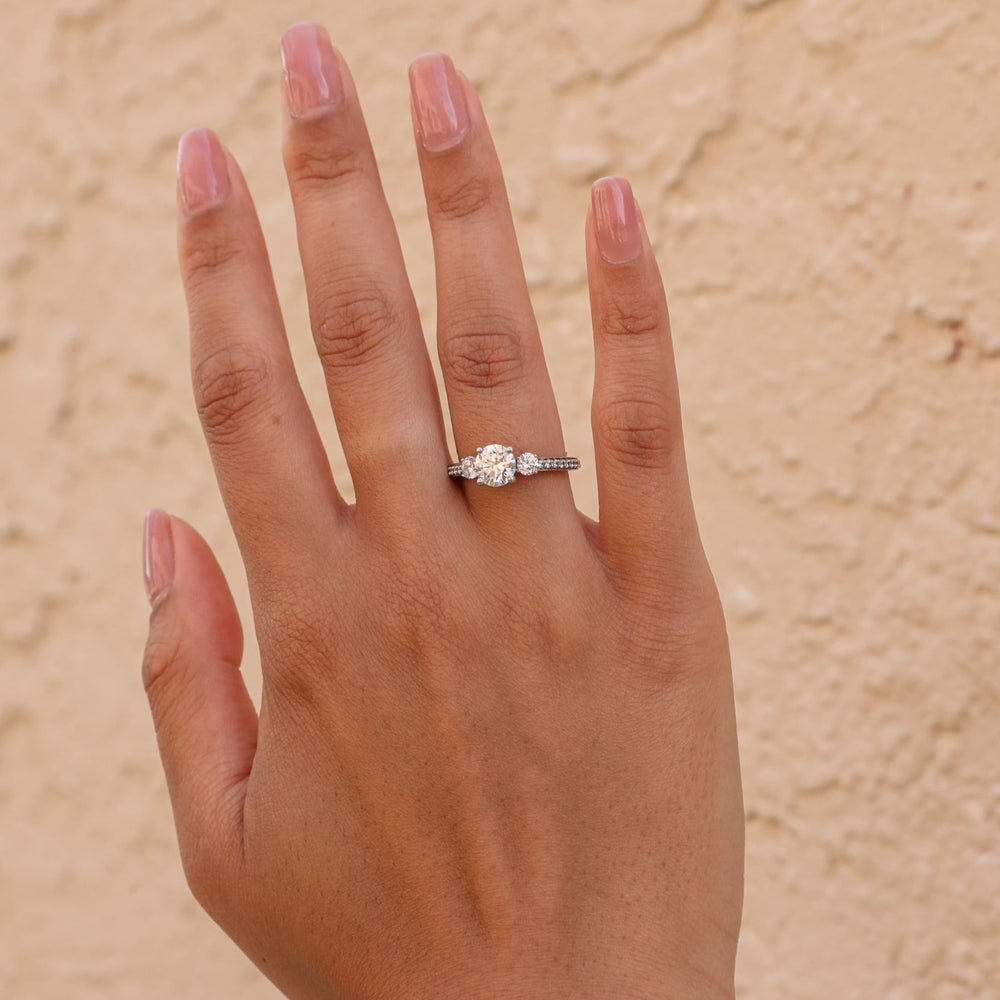 1 1/2 ctw three-stone round french-set diamond engagement ring - Workshop Fine Jewelry