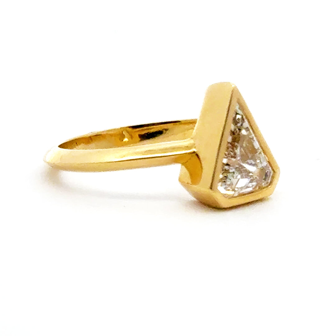 1.37 ct kite diamond full-bezel engagement
