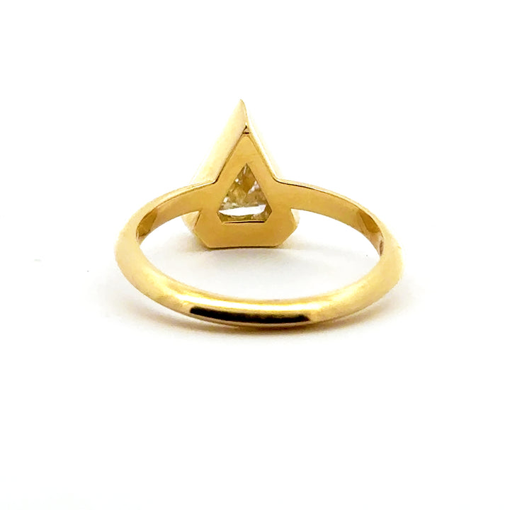 1.37 ct kite diamond full-bezel engagement