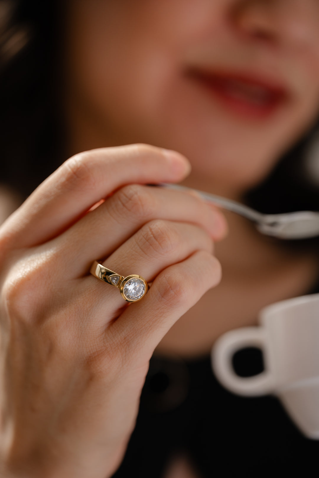 Round diamond bezel three-stone wide band engagement ring with 2.2 ctw diamonds, showcasing elegant craftsmanship and sparkling stones.