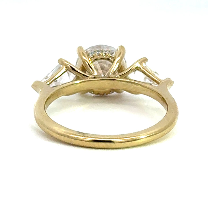 2.8 ctw round diamond three-stone kite with hidden halo engagement ring