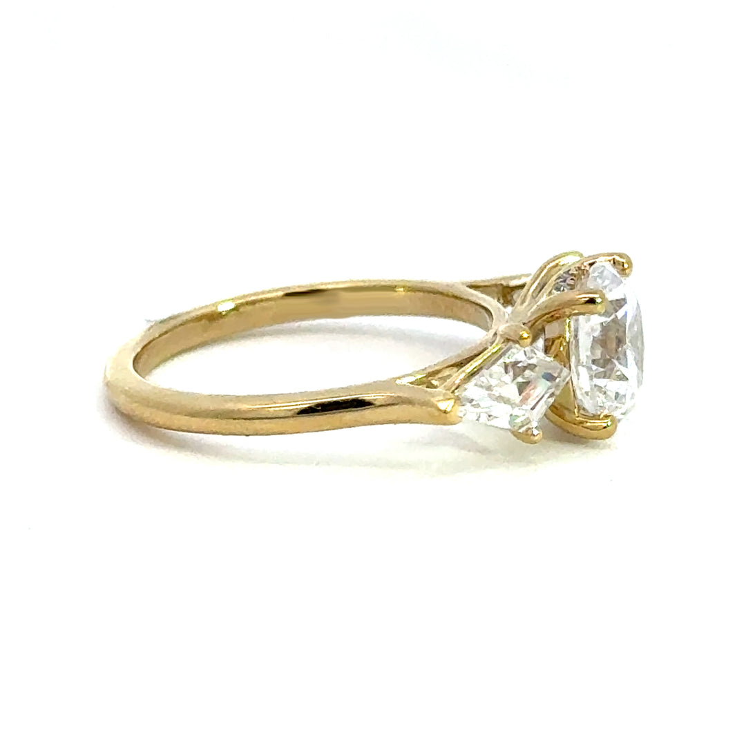 2.8 ctw round diamond three-stone kite with hidden halo engagement ring