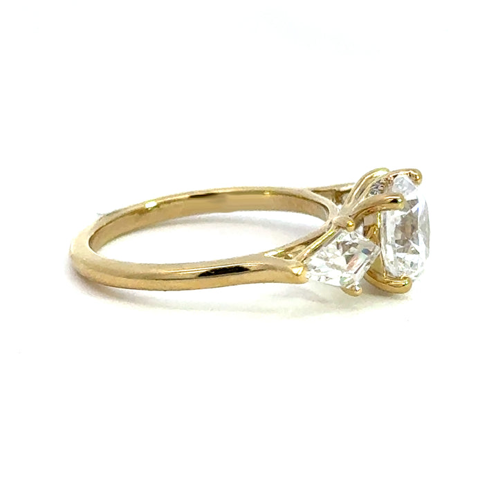 2.8 ctw round diamond three-stone kite with hidden halo engagement ring