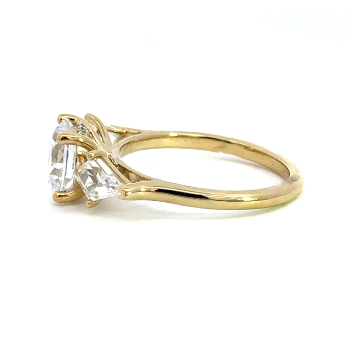 2.8 ctw round diamond three-stone kite with hidden halo engagement ring