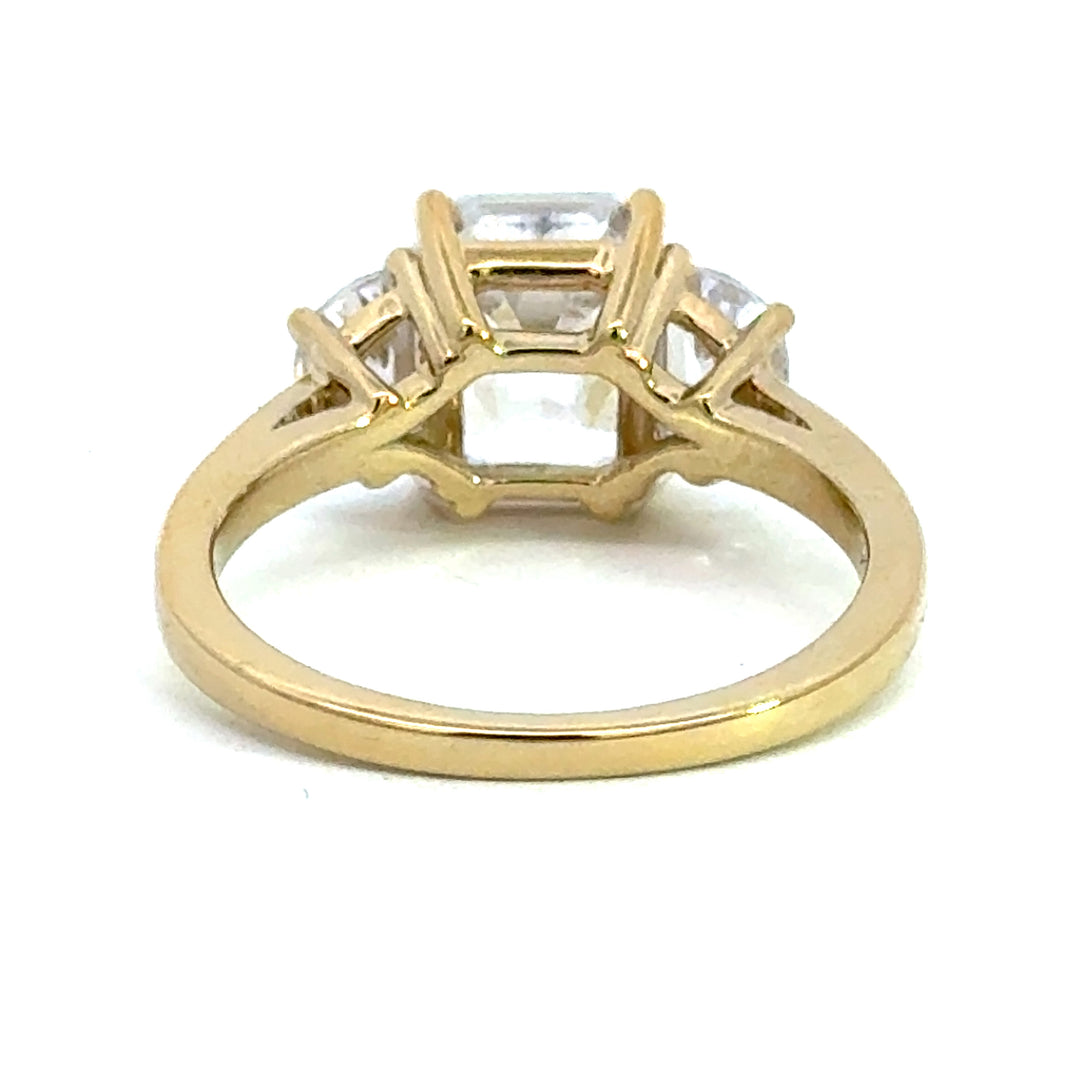 4.0 ctw emerald-cut diamond three-stone mezzaluna half-moon engagement ring