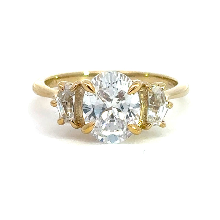 2.5 ctw oval diamond three-stone pentagon engagement ring