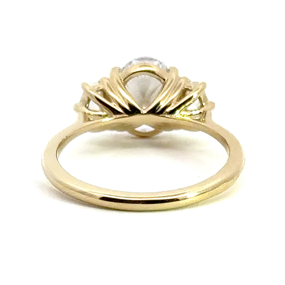 2.5 ctw oval diamond three-stone pentagon engagement ring