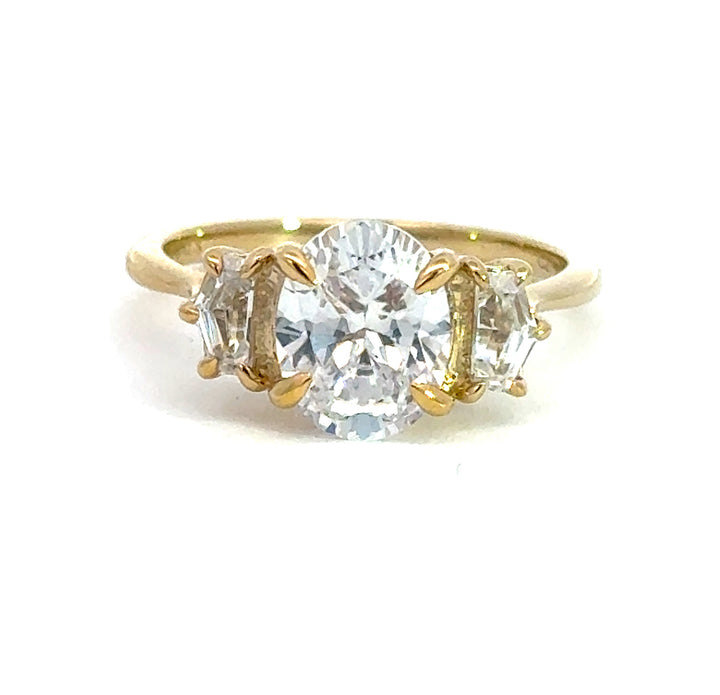 2.5 ctw oval diamond three-stone pentagon engagement ring
