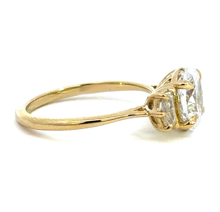 2.5 ctw oval diamond three-stone pentagon engagement ring