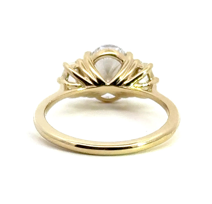 2.5 ctw oval diamond three-stone pentagon engagement ring