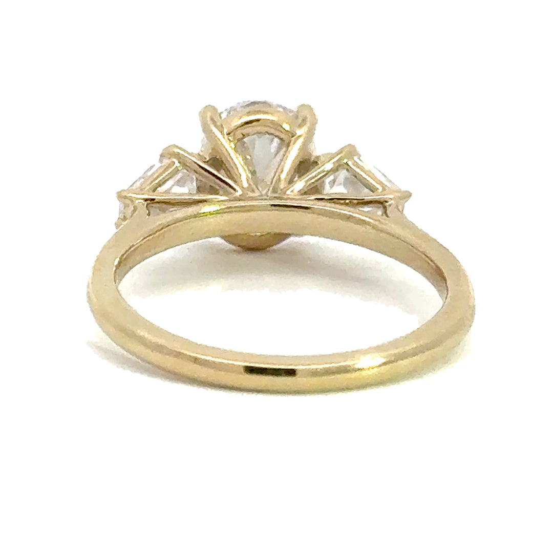 2.5 ctw oval diamond three-stone hexagon engagement ring