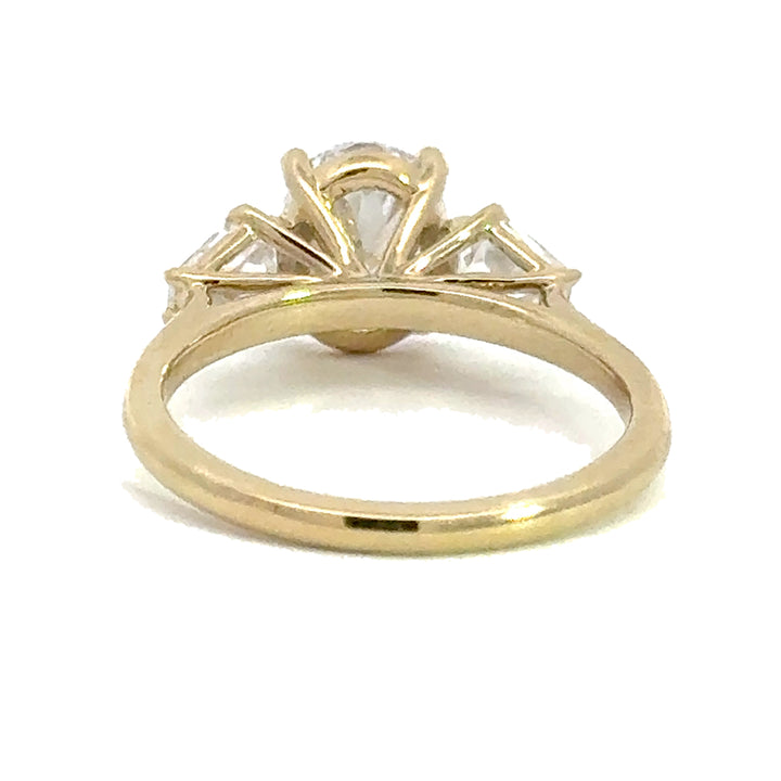 2.5 ctw oval diamond three-stone hexagon engagement ring