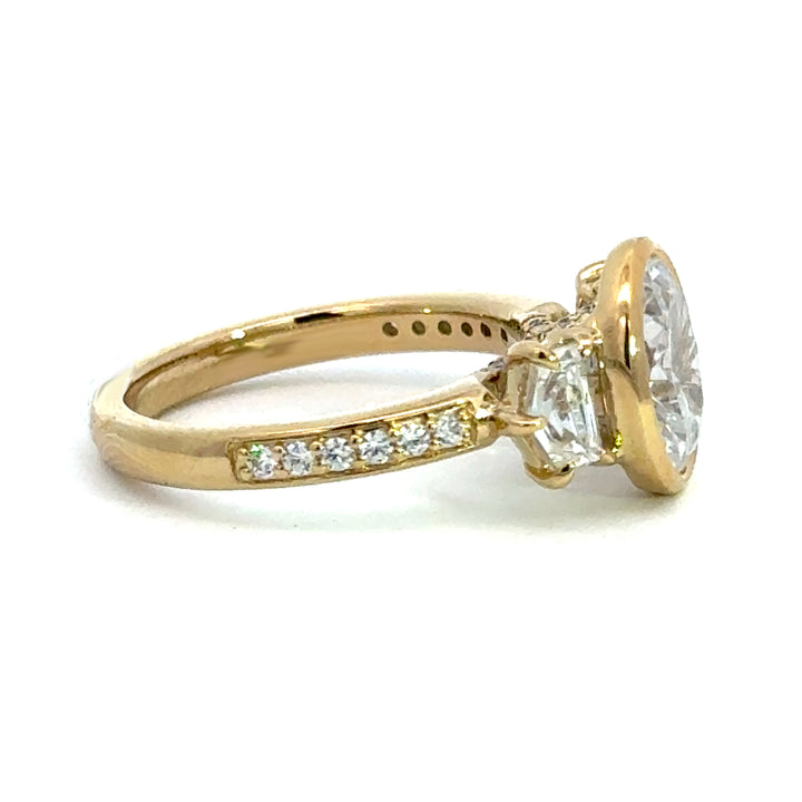 4.1 ctw oval diamond three-stone bezel pentagon with pave band engagement ring