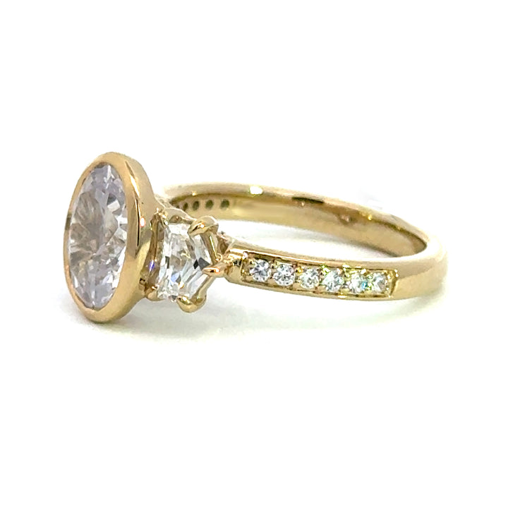 4.1 ctw oval diamond three-stone bezel pentagon with pave band engagement ring