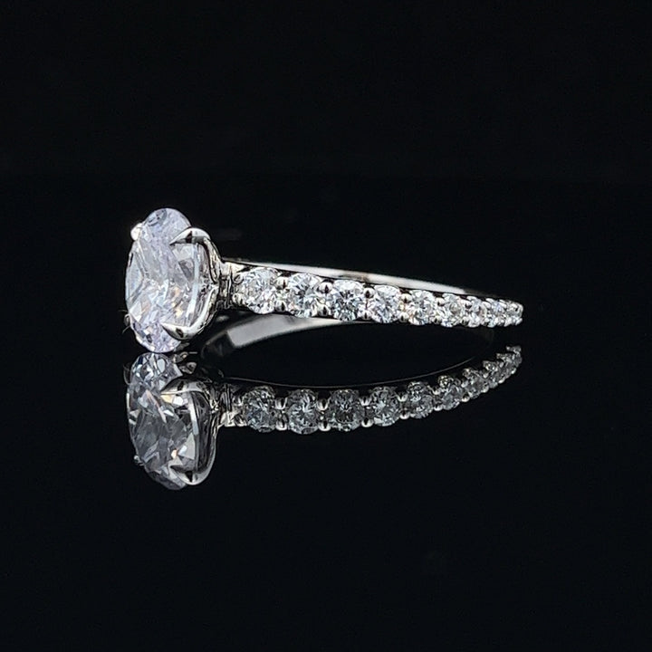 1 1/2 ctw oval diamond engagement ring with graduated diamond accents - workshopunderground.com