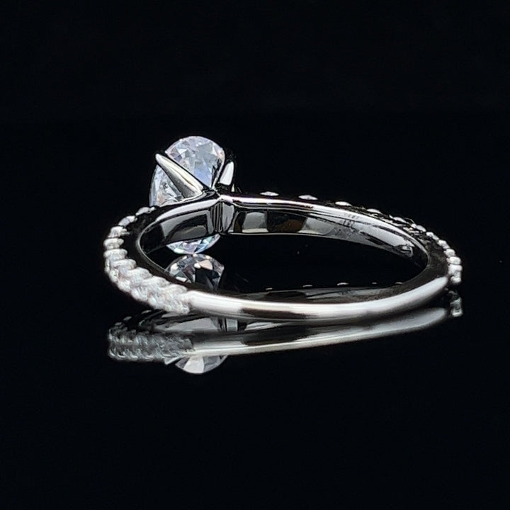 1 1/2 ctw oval diamond engagement ring with graduated diamond accents - workshopunderground.com