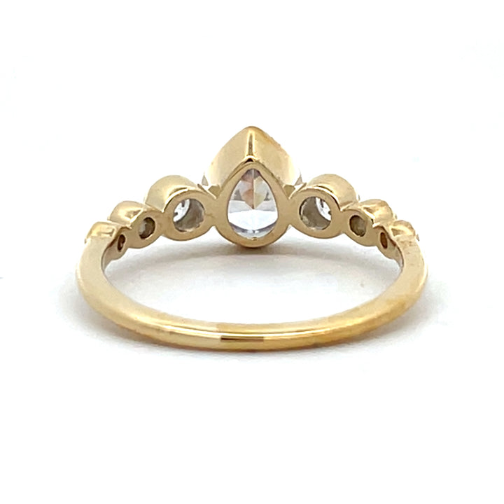 1 ctw pear diamond 7-stone bezel engagement ring