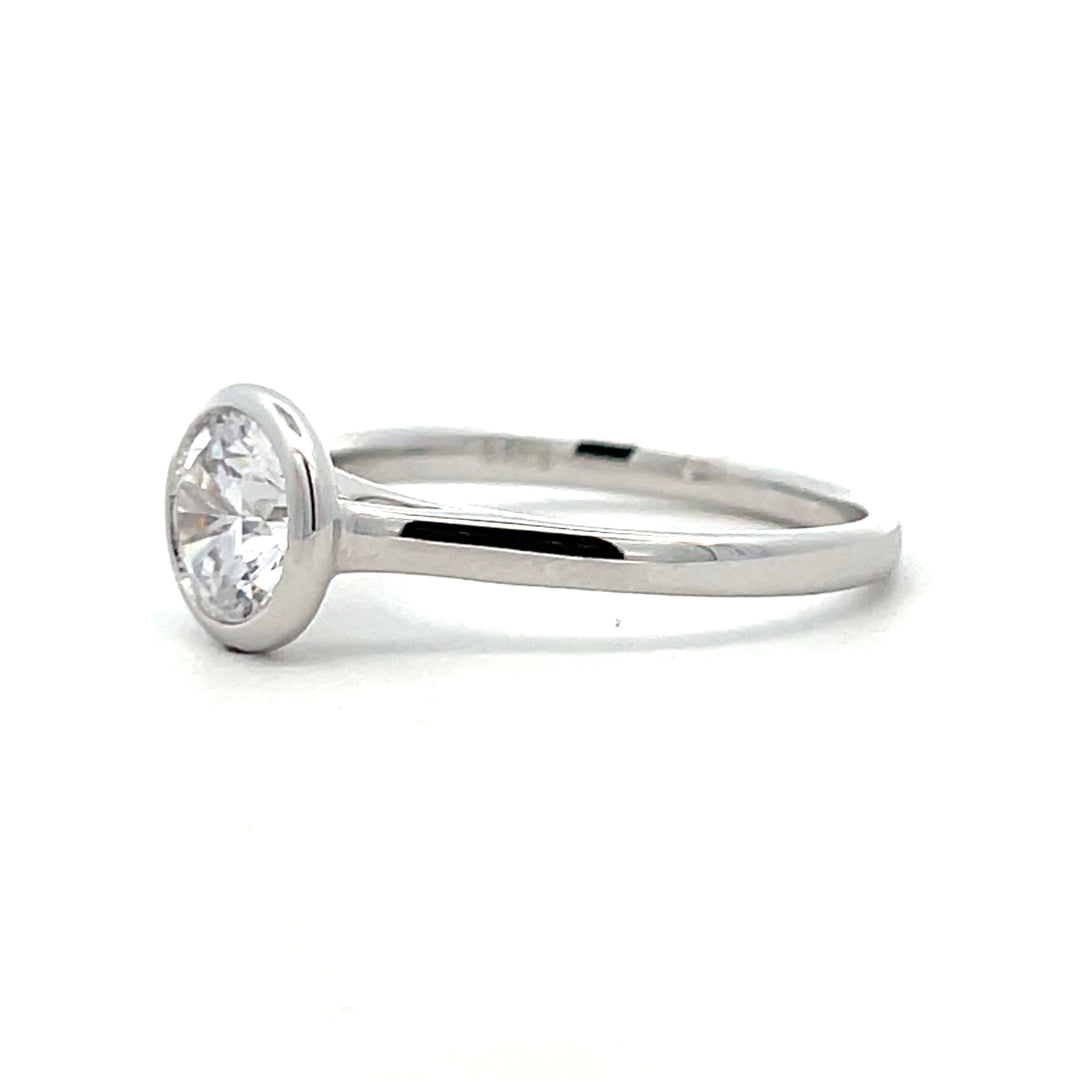 1 ct round diamond bezel cathedral solitaire engagement ring