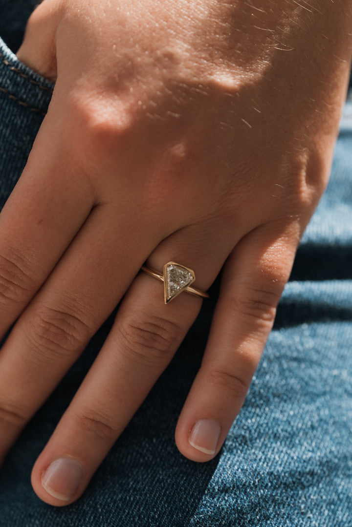 1.37 ct kite diamond full-bezel engagement