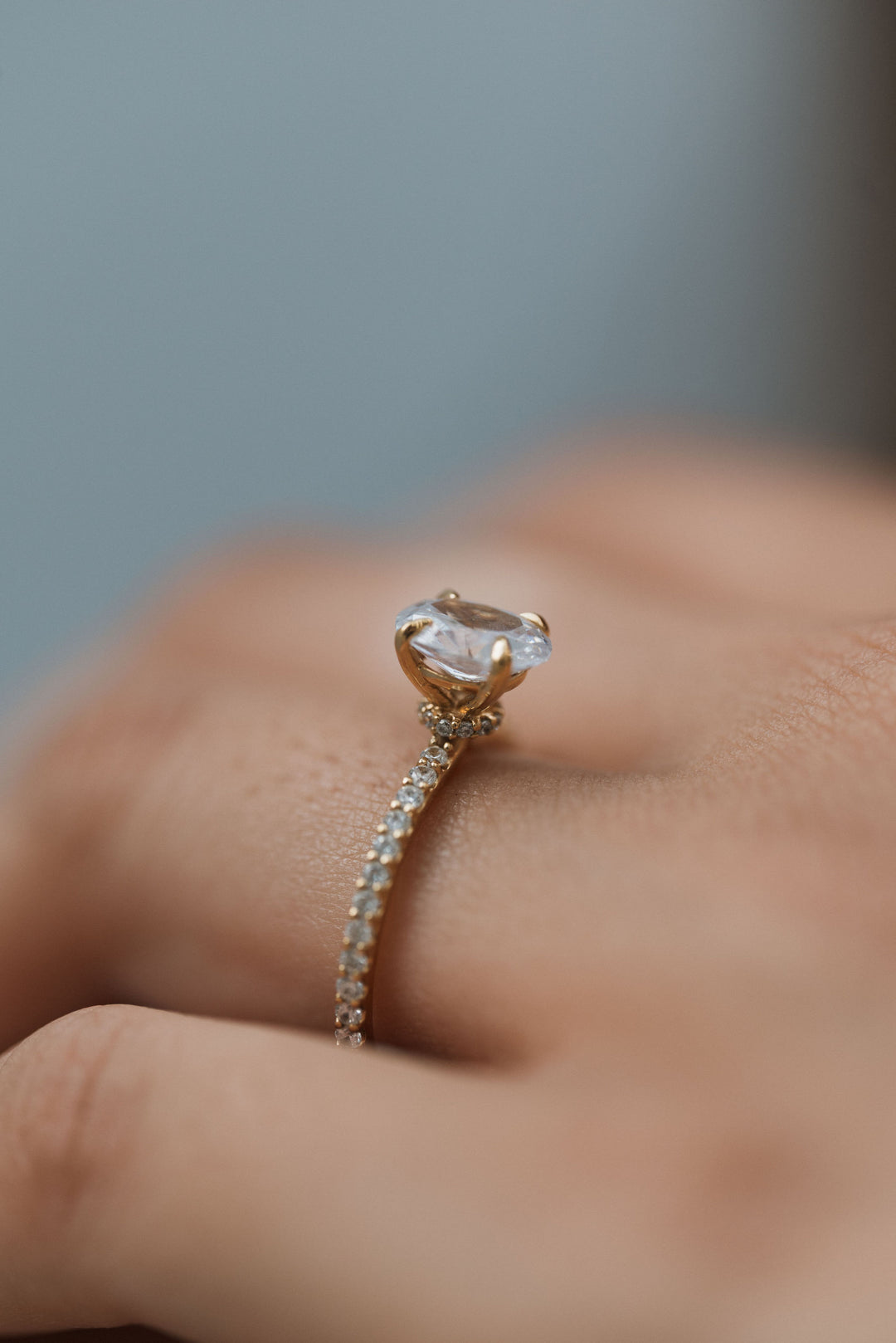 1 1/2 ctw oval diamond engagement ring with pave accents & hidden collar