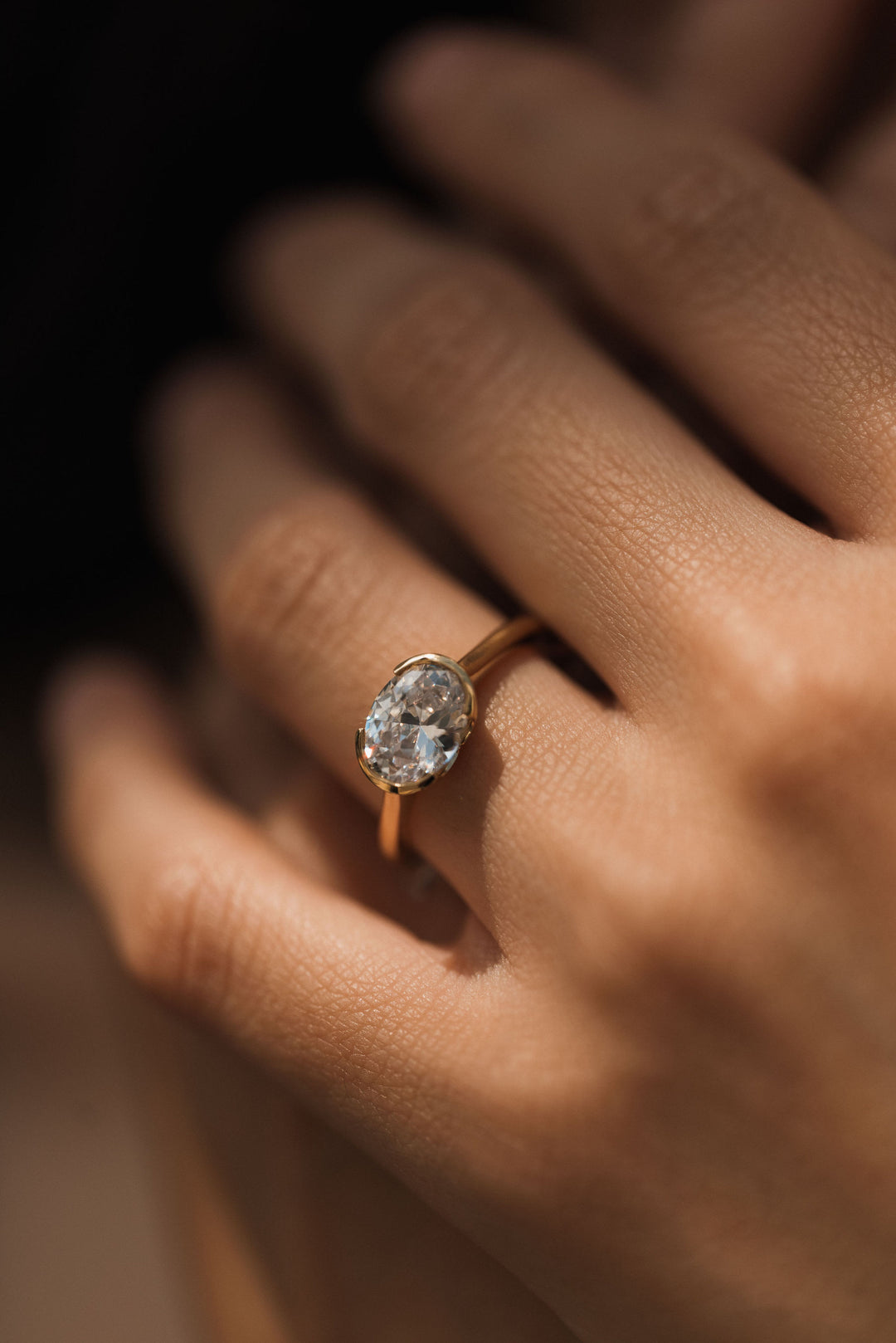 1.75 ct oval diamond half bezel solitaire engagement ring - Workshop Fine Jewelry