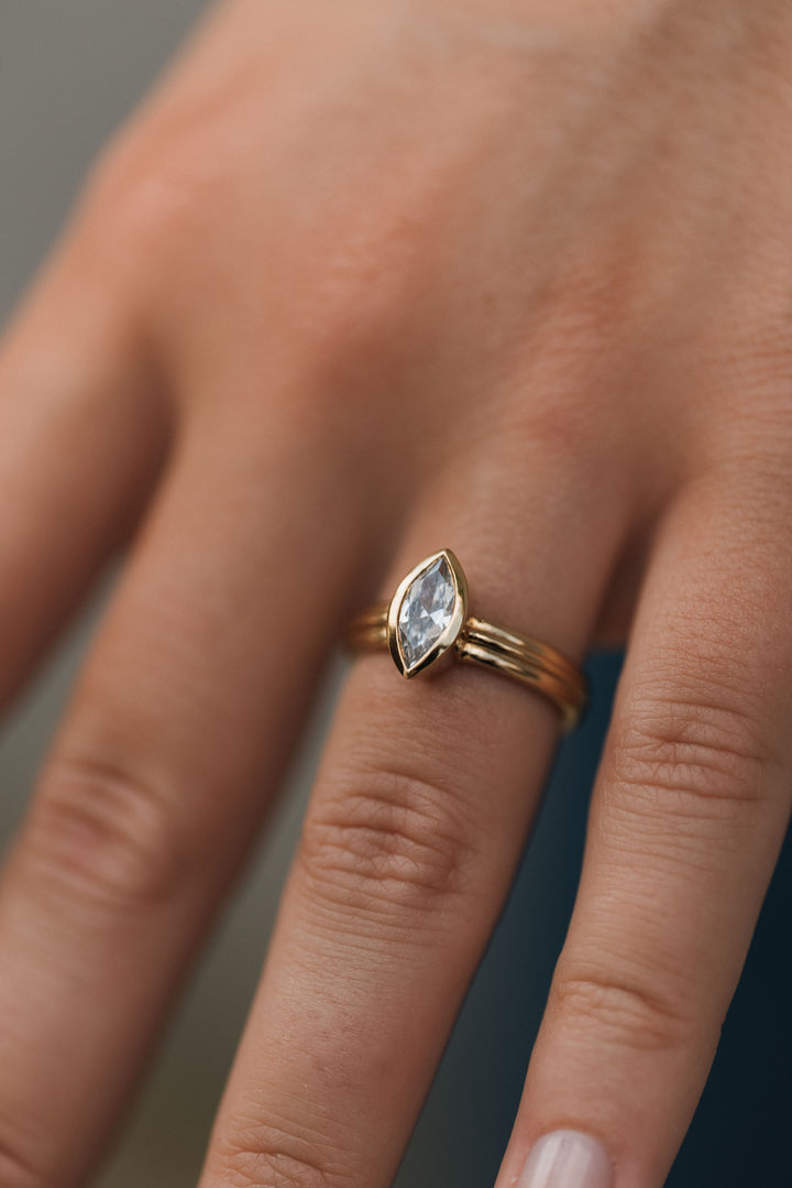 1 ct marquise diamond bezel ribbed engagement ring