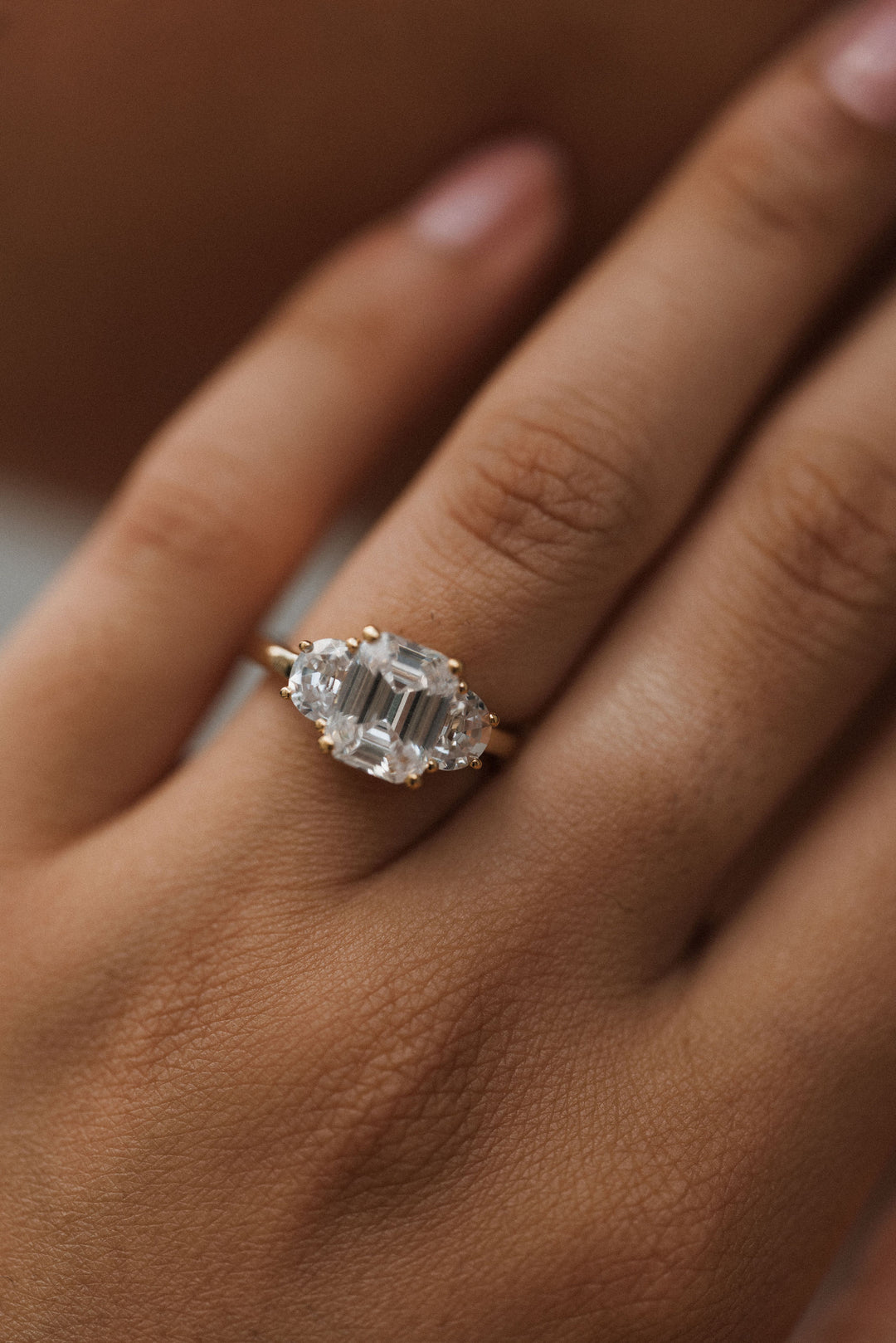 4.0 ctw emerald-cut diamond three-stone mezzaluna half-moon engagement ring