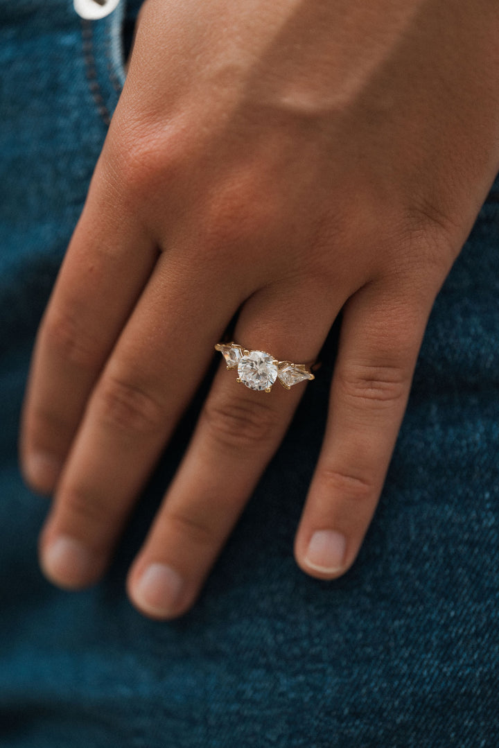 2.8 ctw round diamond three-stone kite with hidden halo engagement ring