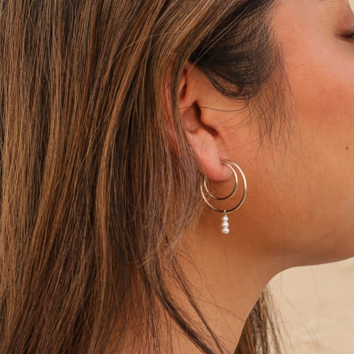 small double hoop earrings with three baby pearls
