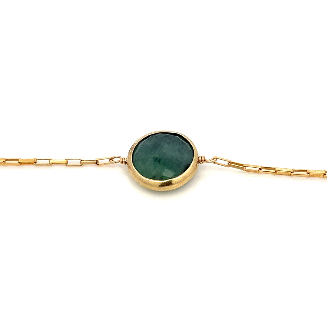golden bezel-set emerald bracelet