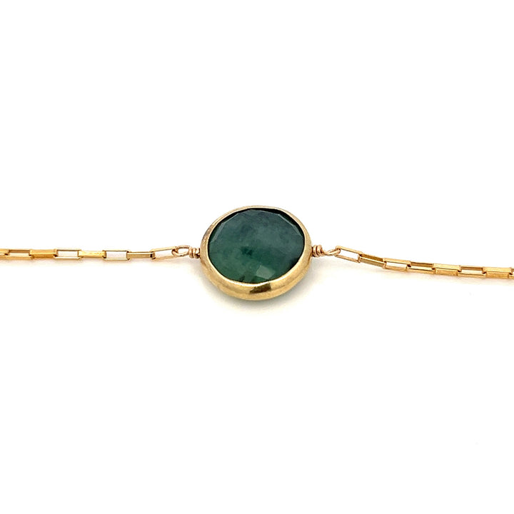 golden bezel-set emerald bracelet