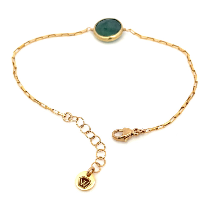 golden bezel-set emerald bracelet
