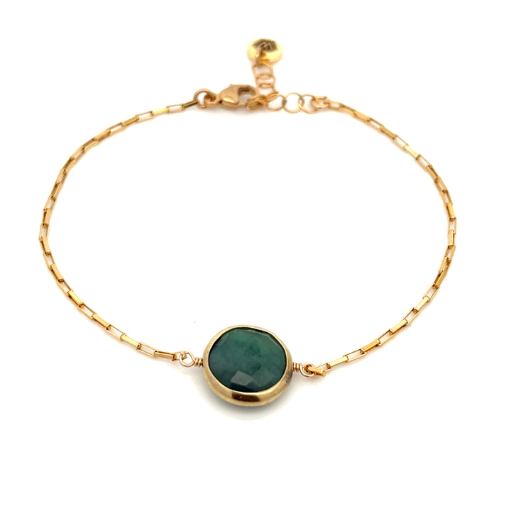 golden bezel-set emerald bracelet