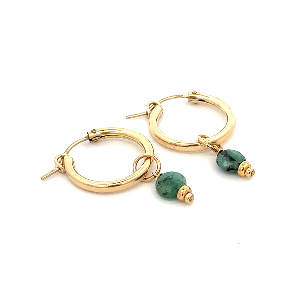 PHYNE faceted birthstone coin charm hoop earrings with emerald gemstone, featuring a stylish and elegant design.