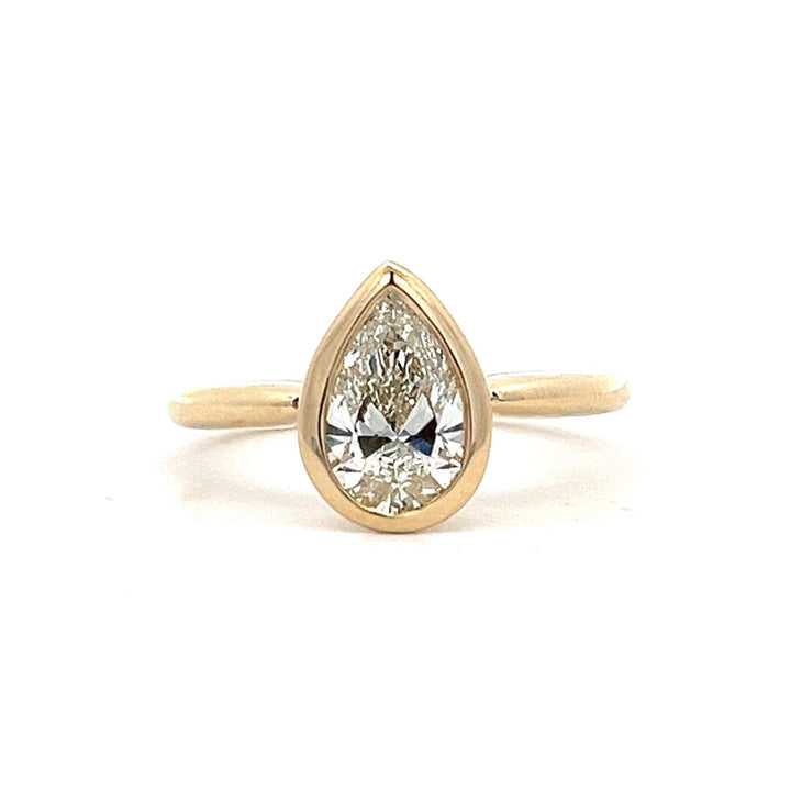 1.25 ctw pear bezel-set engagement ring