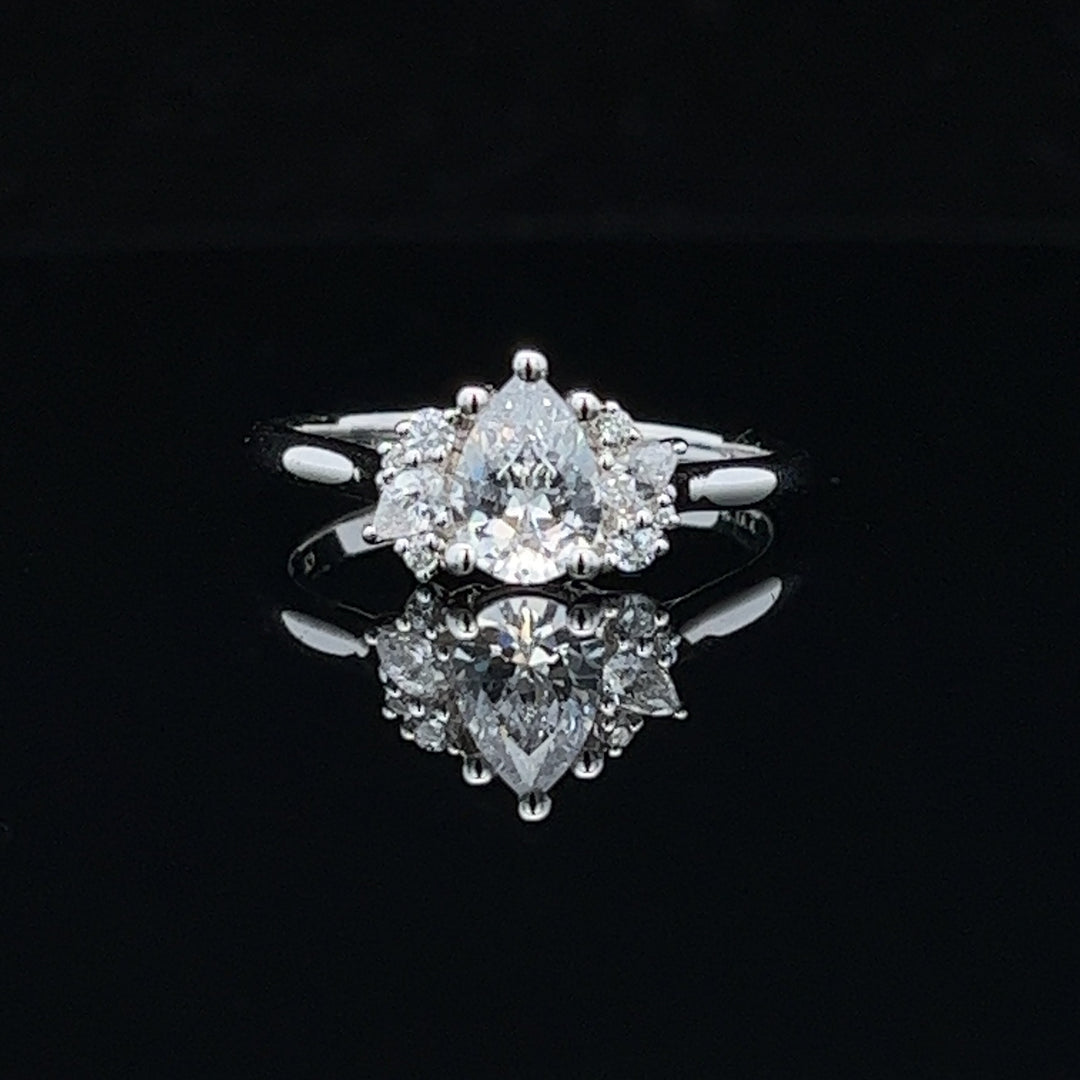 1 5/8 ctw pear diamond engagement ring with diamond accents - workshopunderground.com