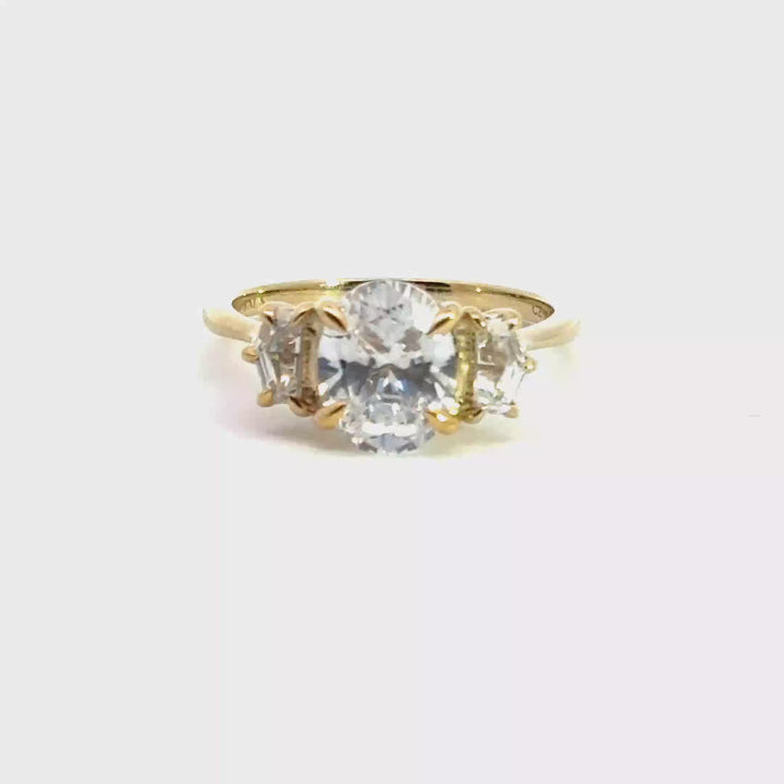 2.5 ctw oval diamond three-stone pentagon engagement ring