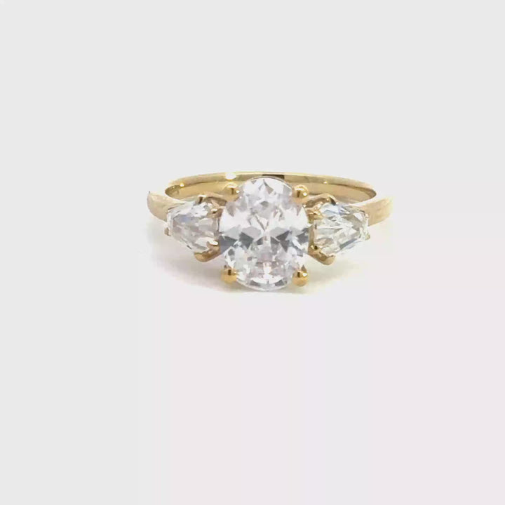 2.5 ctw oval diamond three-stone hexagon engagement ring