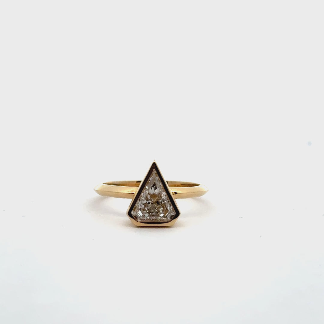 1.37 ct kite diamond full-bezel engagement