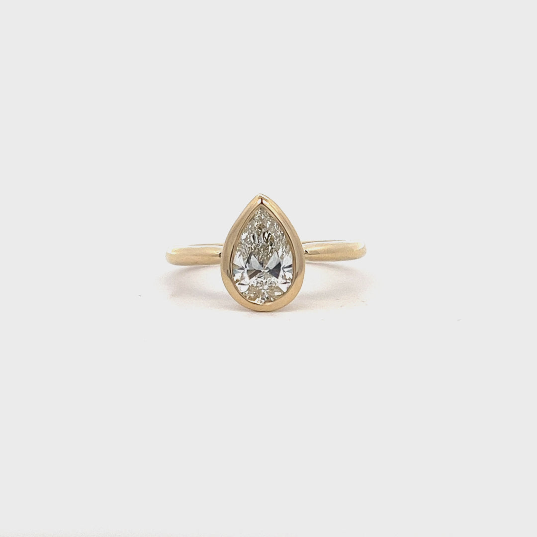 1.25 ctw pear bezel-set engagement ring