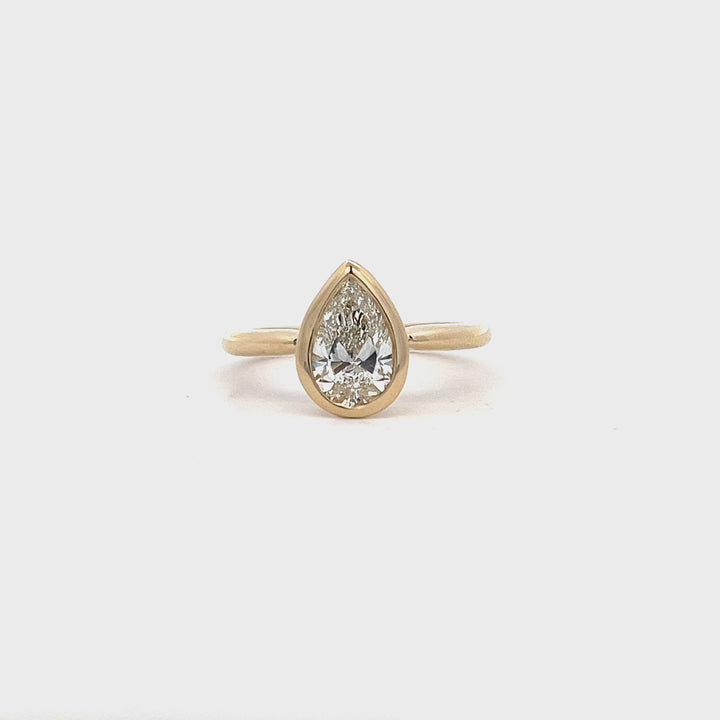 1.25 ctw pear bezel-set engagement ring