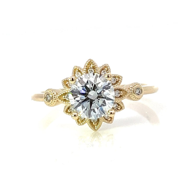 1.25 ctw round diamond sunburst engagement ring with milgrain details