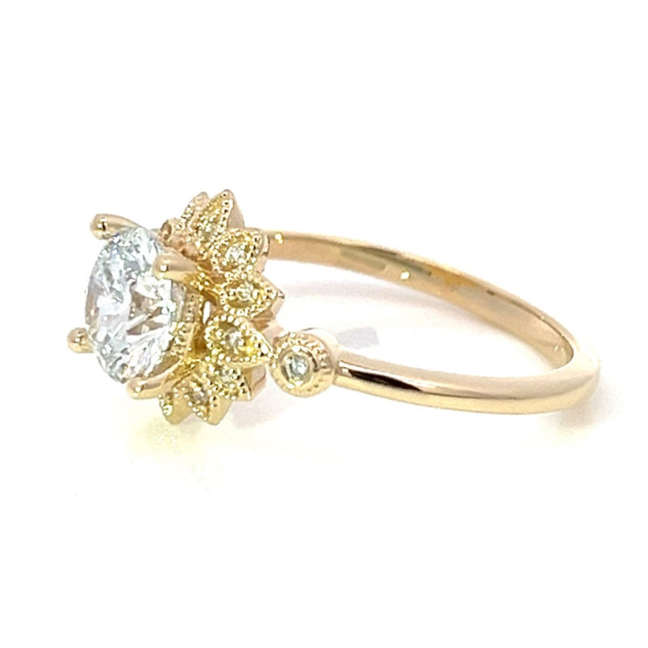 1.25 ctw round diamond sunburst engagement ring with milgrain details