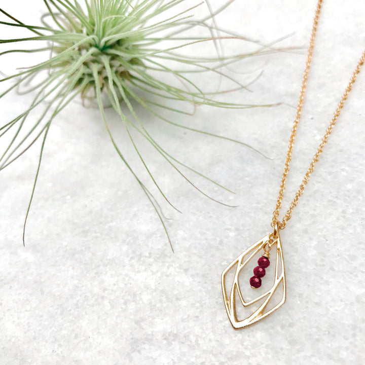 New Deco - three-stone deco pendant necklace - ruby - gold only - workshopunderground.com
