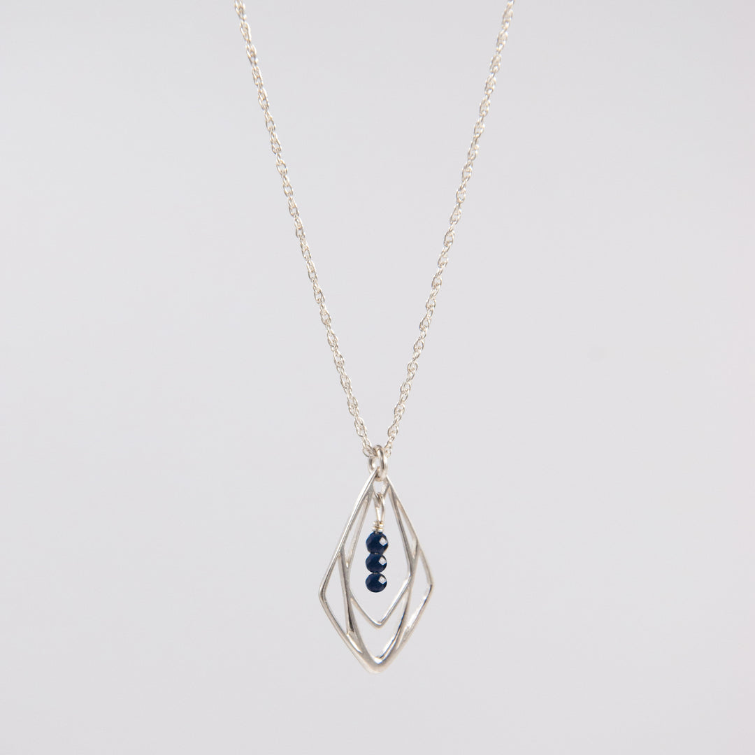 New Deco - three-stone deco pendant necklace - blue sapphire - gold or silver - workshopunderground.com